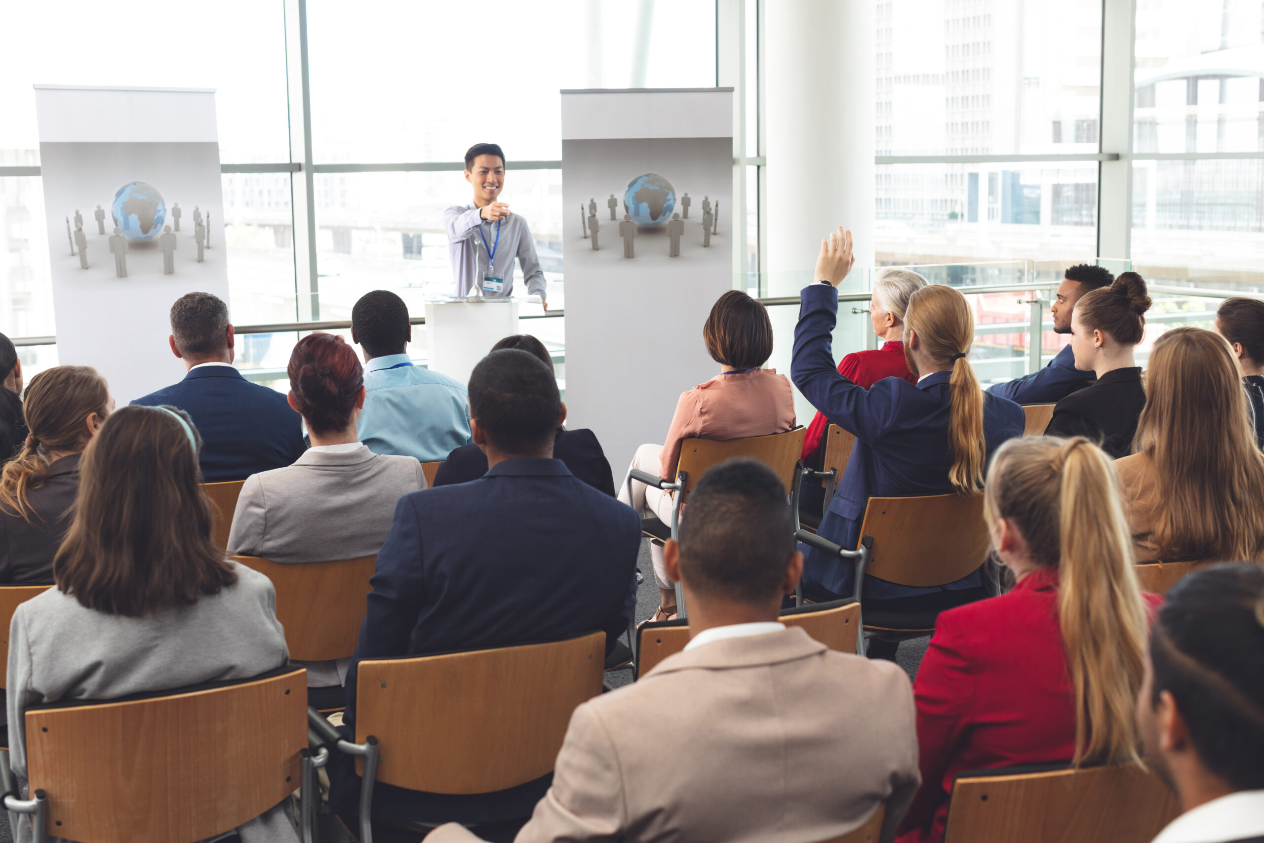A group of business professionals participating in a leadership seminar